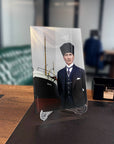 Atatürk glass panel artwork displayed on a desk, featuring a historic ship in the background.
