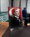 Atatürk 162 Cam Tablo on a desk, featuring a UV-printed design with a Turkish flag background.