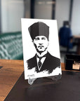 Atatürk 175 Cam Tablo in a modern office setting, showcasing a striking UV-printed glass design.