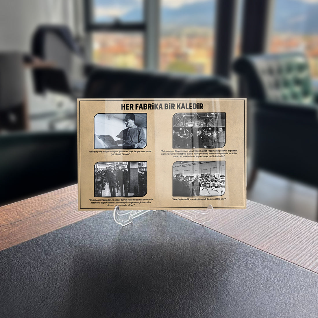Historical display featuring images and text "Her Fabrika Bir Kaledir" on a table.