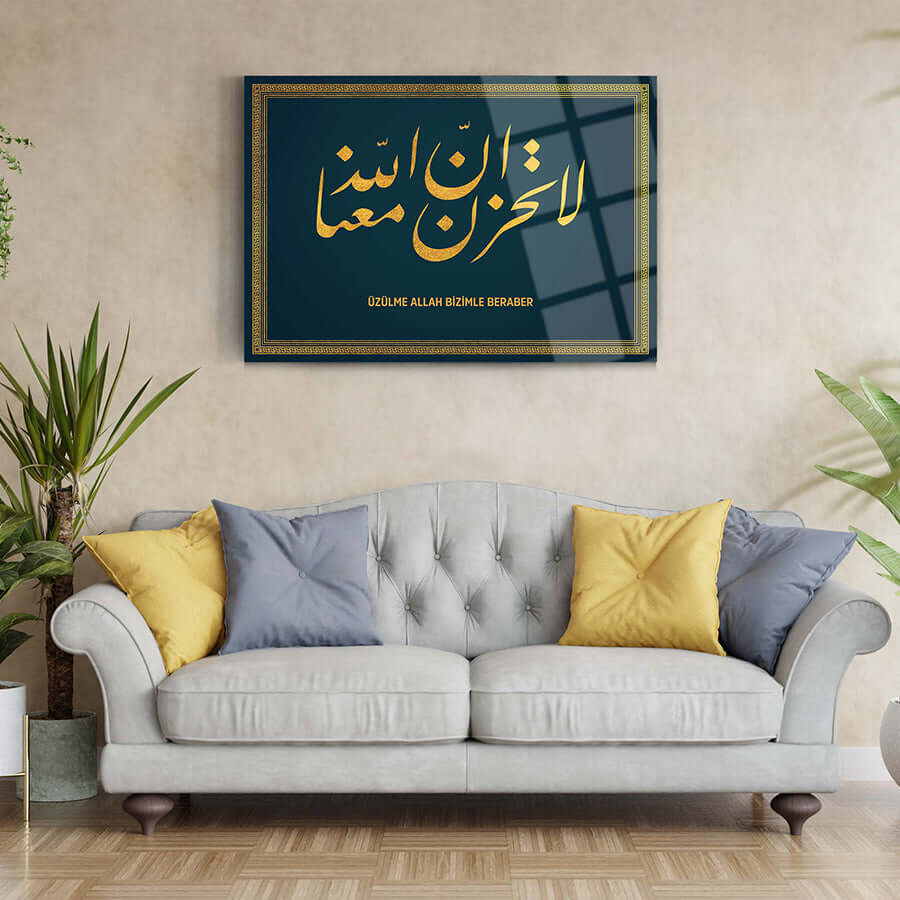 Elegant Tevbe Suresi 40. Ayet 2 decorative glass art piece displayed above a stylish sofa in a contemporary living room.