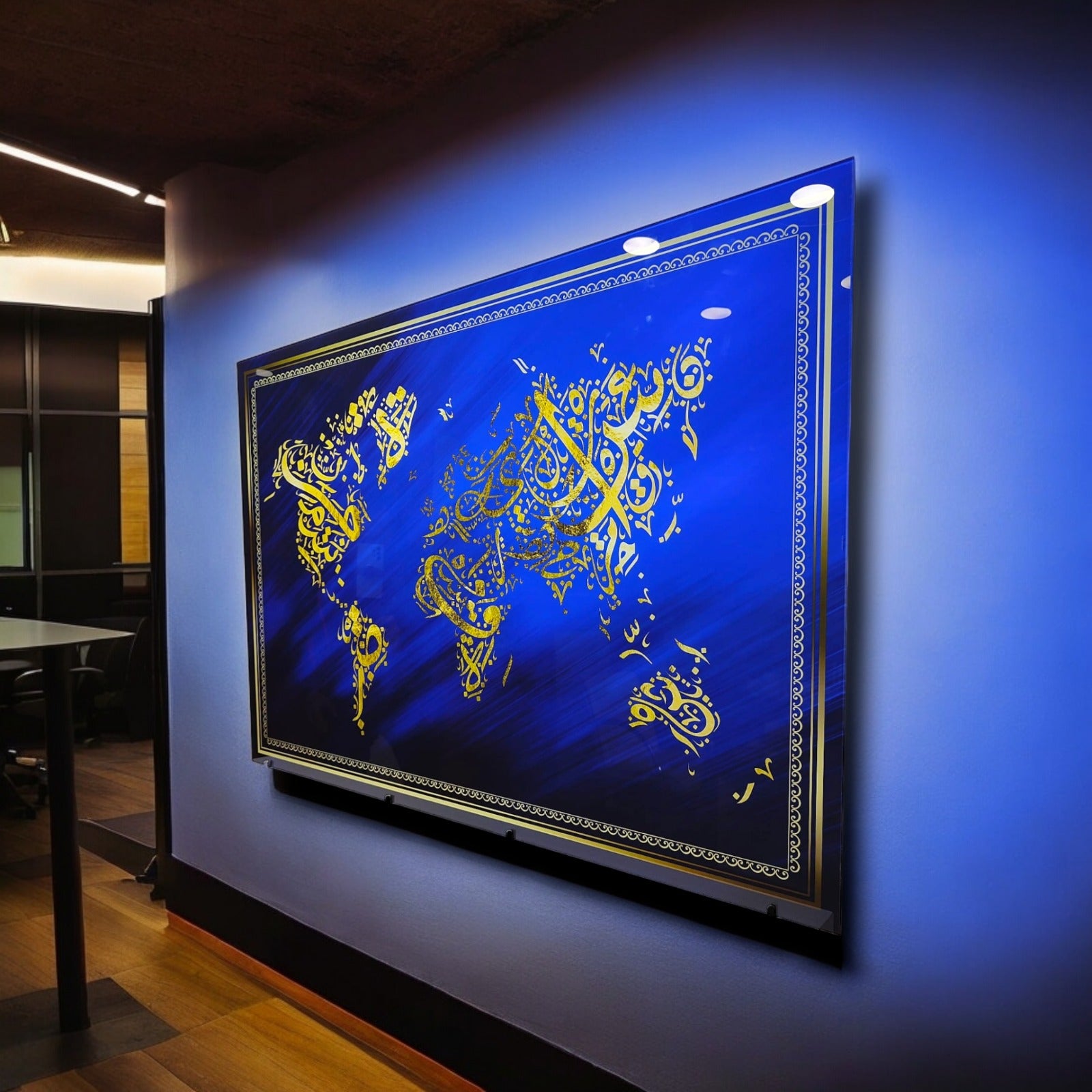 Modern Islamic World Map Glass Art on a blue wall showcasing intricate gold designs.
