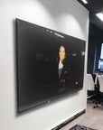 Artistic glass panel featuring a figure, enhancing modern interior decor.