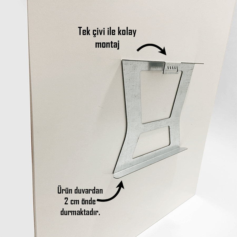 Easy mounting with a single nail for wall art display, showing bracket 2 cm away from the wall.