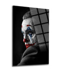 Artistic illustration of a clown character with a serious expression on a striking black background.