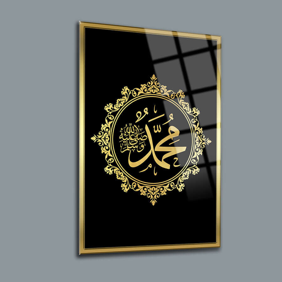 Elegant glass art featuring the name 'Muhammed' in gold on a black background, framed beautifully for modern decor.