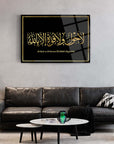 Le Havle Vela Kuvvete Zikri glass art piece with gold design on a stylish living room wall.