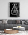Ayetel Kürsi 17 Cam Tablo displayed in a modern living room setting with a gray sofa and stylish decor.