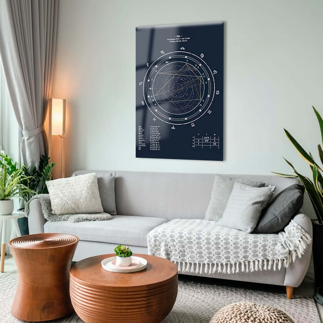 Modern living room featuring a stylish star chart glass decor piece on the wall.