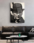 Atatürk 127 Cam Tablo on wall above modern sofa, showcasing sleek design and artistic appeal in home decor.