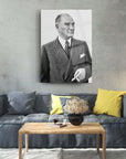 Black and white portrait of a distinguished man in a suit displayed on a wall in a modern living room.