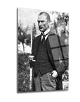 Atatürk 136 Cam Tablo featuring a black and white portrait of a man in elegant attire, showcasing high-quality glass artwork.