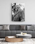 Elegant living room featuring a stylish Atatürk 140 Cam Tablo on the wall above a modern gray sofa.