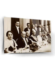 Historical dinner scene featuring elegantly dressed guests at a formal banquet.