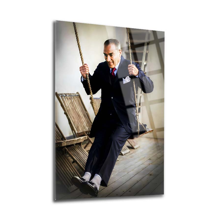 Atatürk 248 Cam Tablo featuring a stylish man on a swing, printed on high-quality tempered glass.