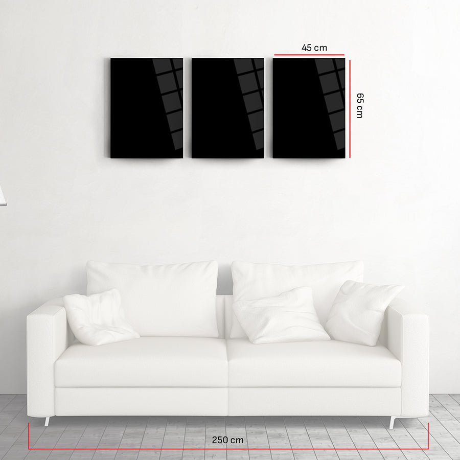 Stylish 3-piece Atatürk glass wall art set displayed above a modern white sofa.