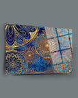 Colorful gold patterned glass artwork with intricate designs and vibrant blue background, perfect for modern home decor.