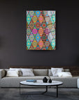 Vibrant Mandala Ruhu Cam Tablo displayed in a modern living room, showcasing intricate geometric patterns.