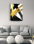 Nordik Sarı Cam Tablo on wall above modern sofa, showcasing bold black and gold abstract design.
