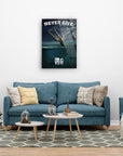 Modern living room with 'Never Give Up' artwork over a teal couch, featuring cozy pillows and stylish decor.