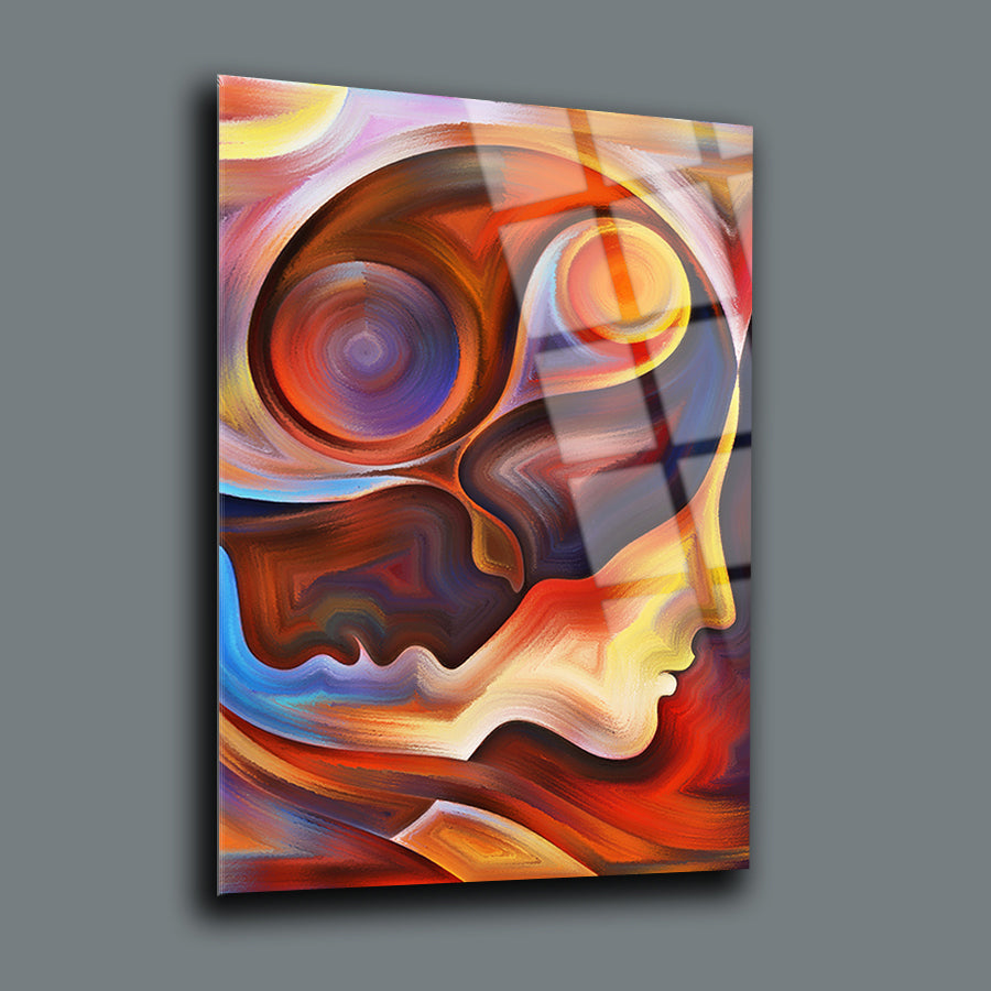 Vibrant abstract art on glass featuring two human silhouettes in colorful patterns and smooth lines.