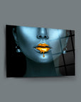 Artistic glass panel featuring a woman's face with golden lips and pearls, showcasing modern design and UV printing.