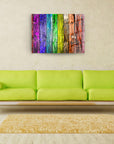 Colorful wooden wall art in a living room above a bright green sofa, enhancing modern decor.