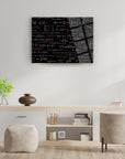 Modern black glass wall art featuring mathematical equations, perfect for a stylish study or living room.
