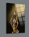 Themis statue on a stylish cam tableau, showcasing justice with sword and scales, an elegant decor piece.