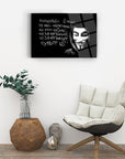 Canvas artwork featuring an iconic figure with text about anonymity and knowledge, set in a contemporary living space.