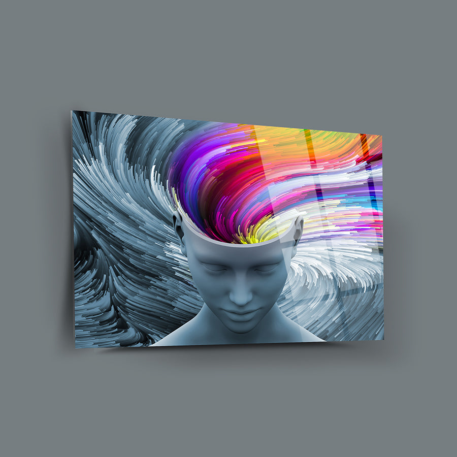 Modern glass wall art featuring abstract colorful thoughts emanating from a serene human figure.