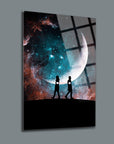 Gece Aşıkları Cam Tablo with cosmic background and two figures walking, perfect for modern home decor.