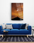 Modern cam tablo of a tree on a hill with a crescent moon, enhancing the cozy living room aesthetic.