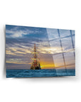 Ufuktaki Gemi Cam Tablo with sunset, showcasing a beautiful sailing ship on the ocean surface.