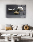 Denge Cam Tablo featuring a modern design with feather, stone, and wood elements, set in a stylish living room.