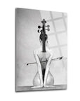 Artistic black and white image of a woman with a violin, showcasing creativity and elegance.