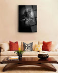 Stylish living room featuring a black and white artwork on the wall, elegant decor, and cozy seating.