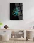 La İlahe İllallah glass wall art displayed in a modern interior with stylish decor.
