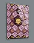 Kıtmir Cam Tablo featuring intricate Islamic calligraphy on a purple geometric design.