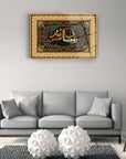 Ramazan Kerim Cam Tablo in a modern living room above a gray sofa, showcasing elegant Islamic art design.