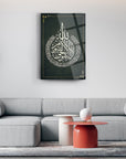 Ayetel Kürsi glass wall art featuring Arabic calligraphy in a modern living room setting.