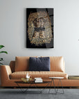 Modern Tutsak Cam Tablo featuring ornate design on a sleek black background, displayed in a stylish living room.