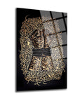 Tutsak Cam Tablo featuring expressive artwork of clenched fists intertwined with intricate calligraphy design.