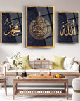 Elegant 3-piece glass wall art set featuring Arabic calligraphy of Allah and Muhammad in a modern living room.