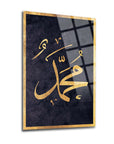Elegant glass wall art featuring gold Arabic calligraphy of Prophet Muhammad on a textured black background.