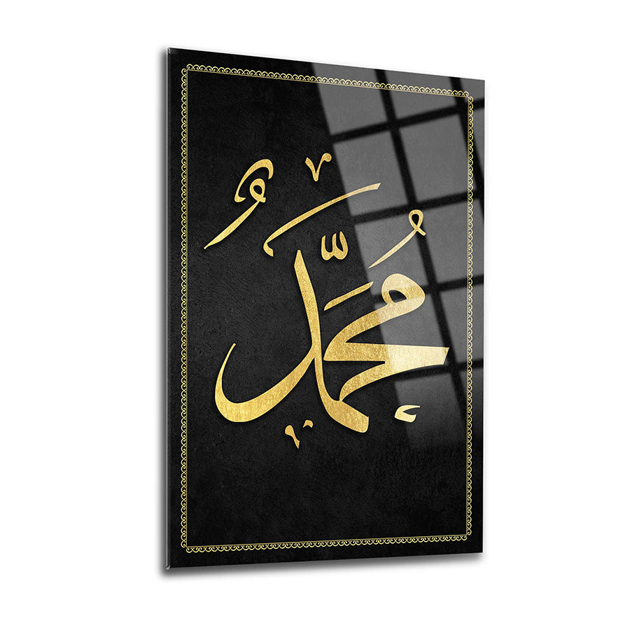 Sleek glass artwork featuring elegant Arabic calligraphy of the name Muhammad on a black background.