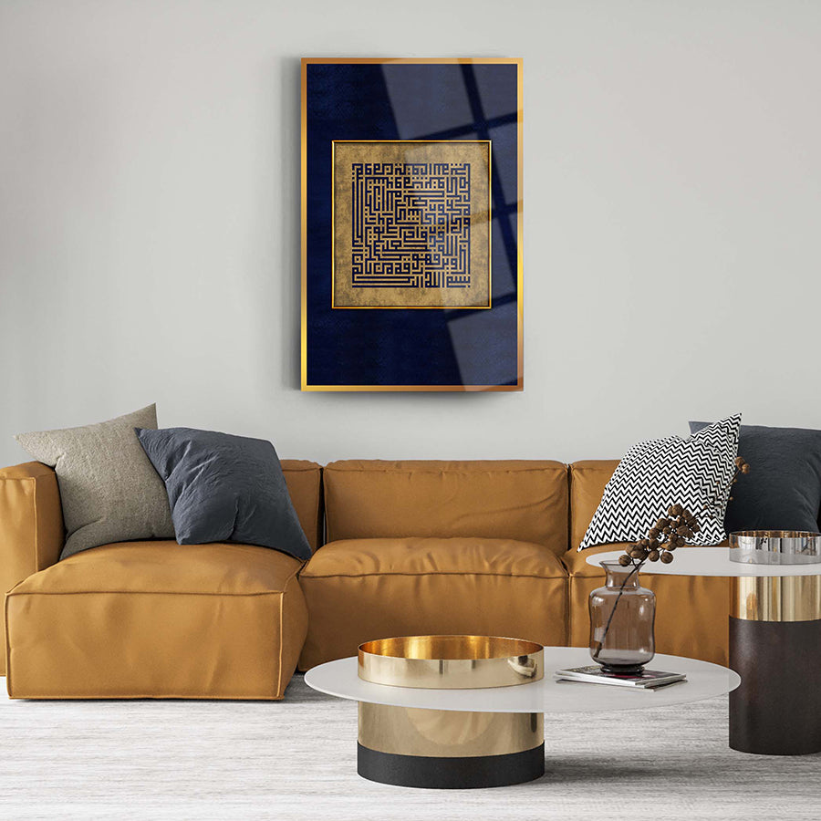 Kufi Talak Suresi Cam Tablo on a wall above a stylish sofa and coffee table in a modern living room.
