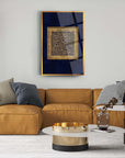 Kufi Talak Suresi Cam Tablo on a wall above a stylish sofa and coffee table in a modern living room.