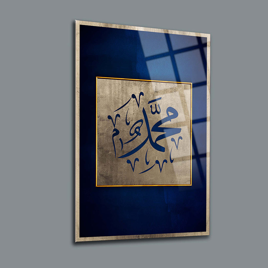 Muhammed S.A.V. calligraphy artwork on a blue background, elegantly framed for wall display.
