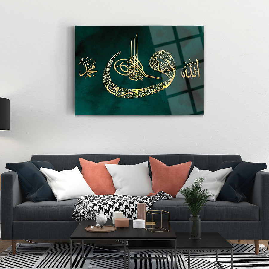 Elegant Allah Muhammed Tuğra glass wall art in living room decor, featuring intricate golden design on green background.